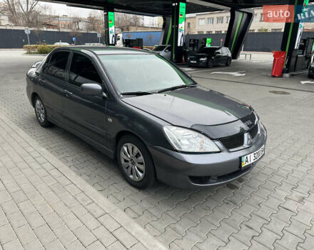 Сірий Міцубісі Lancer, об'ємом двигуна 1.6 л та пробігом 115 тис. км за 2800 $, фото 5 на Automoto.ua