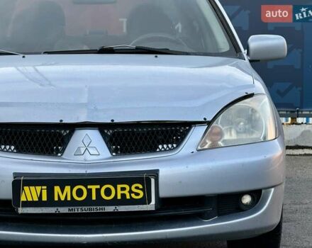 Сірий Міцубісі Lancer, об'ємом двигуна 1.6 л та пробігом 395 тис. км за 4900 $, фото 6 на Automoto.ua