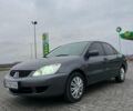 Сірий Міцубісі Lancer, об'ємом двигуна 1.6 л та пробігом 253 тис. км за 3100 $, фото 8 на Automoto.ua