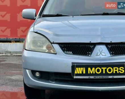 Сірий Міцубісі Lancer, об'ємом двигуна 1.6 л та пробігом 395 тис. км за 4900 $, фото 5 на Automoto.ua