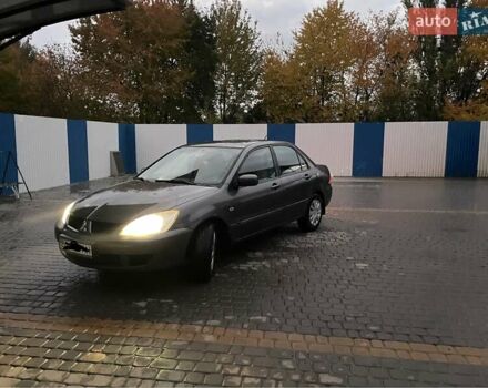 Сірий Міцубісі Lancer, об'ємом двигуна 1.6 л та пробігом 330 тис. км за 3500 $, фото 28 на Automoto.ua