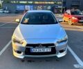 Серый Мицубиси Лансер, объемом двигателя 2 л и пробегом 122 тыс. км за 8200 $, фото 1 на Automoto.ua