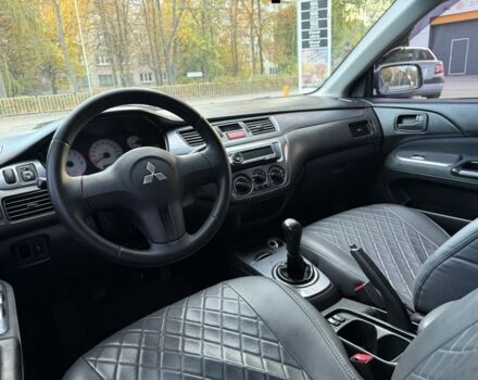 Серый Мицубиси Лансер, объемом двигателя 1.6 л и пробегом 220 тыс. км за 3199 $, фото 8 на Automoto.ua