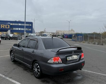 Серый Мицубиси Лансер, объемом двигателя 1.6 л и пробегом 350 тыс. км за 2850 $, фото 7 на Automoto.ua