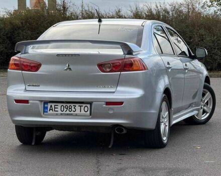 Серый Мицубиси Лансер, объемом двигателя 2 л и пробегом 207 тыс. км за 5800 $, фото 7 на Automoto.ua