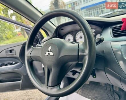 Сірий Міцубісі Lancer, об'ємом двигуна 1.58 л та пробігом 138 тис. км за 4990 $, фото 27 на Automoto.ua