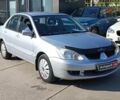 Сірий Міцубісі Lancer, об'ємом двигуна 1.6 л та пробігом 222 тис. км за 3990 $, фото 6 на Automoto.ua