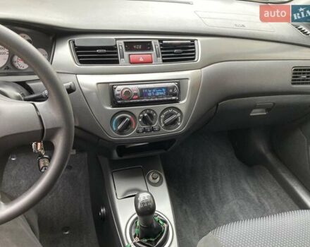 Сірий Міцубісі Lancer, об'ємом двигуна 1.59 л та пробігом 44 тис. км за 6200 $, фото 4 на Automoto.ua