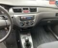 Сірий Міцубісі Lancer, об'ємом двигуна 1.59 л та пробігом 44 тис. км за 6200 $, фото 4 на Automoto.ua
