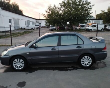 Сірий Міцубісі Lancer, об'ємом двигуна 1.6 л та пробігом 178 тис. км за 5464 $, фото 12 на Automoto.ua