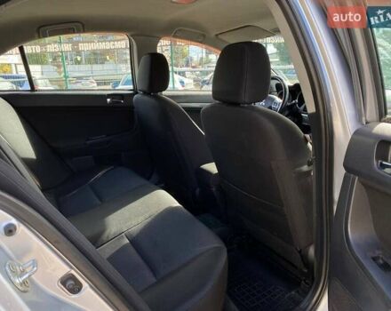 Серый Мицубиси Лансер, объемом двигателя 2 л и пробегом 150 тыс. км за 6100 $, фото 14 на Automoto.ua