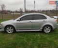 Сірий Міцубісі Lancer, об'ємом двигуна 2 л та пробігом 124 тис. км за 7499 $, фото 4 на Automoto.ua