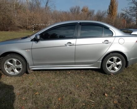 Серый Мицубиси Лансер, объемом двигателя 2 л и пробегом 180 тыс. км за 5800 $, фото 12 на Automoto.ua