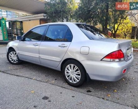 Сірий Міцубісі Lancer, об'ємом двигуна 1.58 л та пробігом 122 тис. км за 6300 $, фото 2 на Automoto.ua