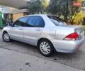 Сірий Міцубісі Lancer, об'ємом двигуна 1.58 л та пробігом 122 тис. км за 6300 $, фото 2 на Automoto.ua