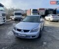 Серый Мицубиси Лансер, объемом двигателя 1.6 л и пробегом 310 тыс. км за 3850 $, фото 1 на Automoto.ua