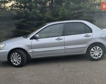 Сірий Міцубісі Lancer, об'ємом двигуна 1.6 л та пробігом 213 тис. км за 3600 $, фото 12 на Automoto.ua