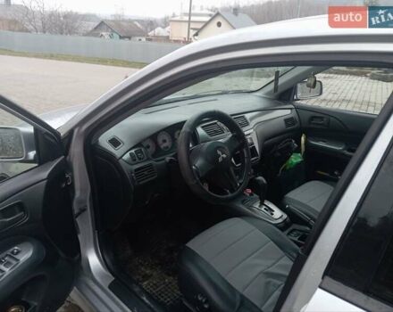 Серый Мицубиси Лансер, объемом двигателя 1.6 л и пробегом 175 тыс. км за 4200 $, фото 6 на Automoto.ua