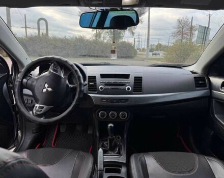 Серый Мицубиси Лансер, объемом двигателя 2 л и пробегом 207 тыс. км за 5800 $, фото 15 на Automoto.ua