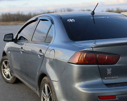 Серый Мицубиси Лансер, объемом двигателя 1.5 л и пробегом 330 тыс. км за 5250 $, фото 13 на Automoto.ua