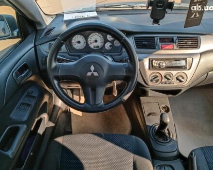 Сірий Міцубісі Lancer, об'ємом двигуна 1.6 л та пробігом 222 тис. км за 3990 $, фото 24 на Automoto.ua