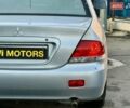 Сірий Міцубісі Lancer, об'ємом двигуна 1.6 л та пробігом 395 тис. км за 4900 $, фото 11 на Automoto.ua
