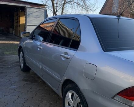 Сірий Міцубісі Lancer, об'ємом двигуна 1.6 л та пробігом 248 тис. км за 3000 $, фото 5 на Automoto.ua