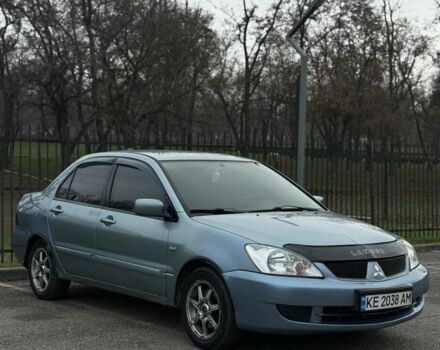 Серый Мицубиси Лансер, объемом двигателя 1.6 л и пробегом 238 тыс. км за 4300 $, фото 20 на Automoto.ua