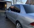 Сірий Міцубісі Lancer, об'ємом двигуна 1.6 л та пробігом 248 тис. км за 3000 $, фото 5 на Automoto.ua