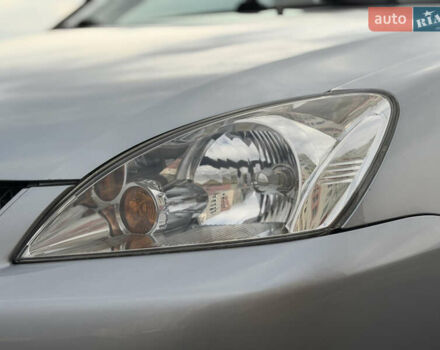 Серый Мицубиси Лансер, объемом двигателя 1.3 л и пробегом 160 тыс. км за 5555 $, фото 26 на Automoto.ua