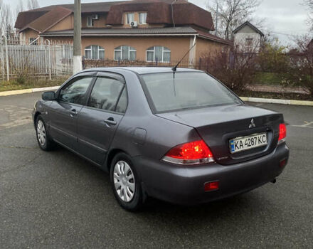 Серый Мицубиси Лансер, объемом двигателя 1.6 л и пробегом 346 тыс. км за 4299 $, фото 1 на Automoto.ua
