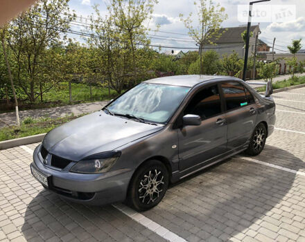 Сірий Міцубісі Lancer, об'ємом двигуна 1.58 л та пробігом 257 тис. км за 4400 $, фото 3 на Automoto.ua