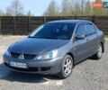 Сірий Міцубісі Lancer, об'ємом двигуна 1.58 л та пробігом 260 тис. км за 4000 $, фото 1 на Automoto.ua