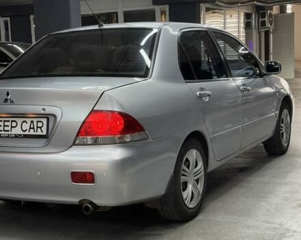 Серый Мицубиси Лансер, объемом двигателя 1.58 л и пробегом 271 тыс. км за 4200 $, фото 13 на Automoto.ua