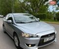 Серый Мицубиси Лансер, объемом двигателя 2 л и пробегом 220 тыс. км за 5999 $, фото 1 на Automoto.ua