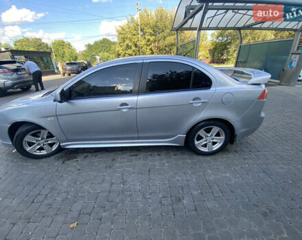 Серый Мицубиси Лансер, объемом двигателя 2 л и пробегом 215 тыс. км за 5750 $, фото 3 на Automoto.ua