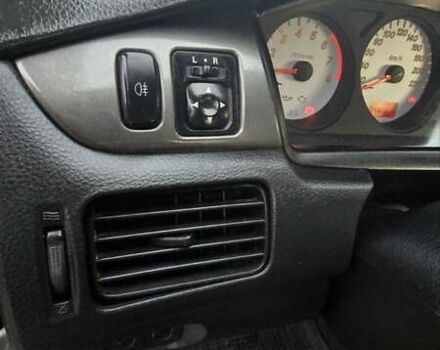 Сірий Міцубісі Lancer, об'ємом двигуна 1.6 л та пробігом 213 тис. км за 3600 $, фото 19 на Automoto.ua