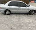 Серый Мицубиси Лансер, объемом двигателя 1.6 л и пробегом 263 тыс. км за 2350 $, фото 7 на Automoto.ua