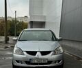 Серый Мицубиси Лансер, объемом двигателя 1.58 л и пробегом 250 тыс. км за 3500 $, фото 1 на Automoto.ua