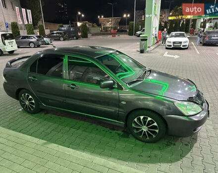 Серый Мицубиси Лансер, объемом двигателя 1.6 л и пробегом 112 тыс. км за 2800 $, фото 8 на Automoto.ua