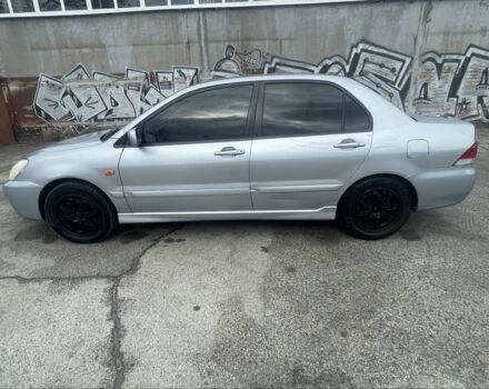 Сірий Міцубісі Lancer, об'ємом двигуна 1.6 л та пробігом 200 тис. км за 4200 $, фото 2 на Automoto.ua