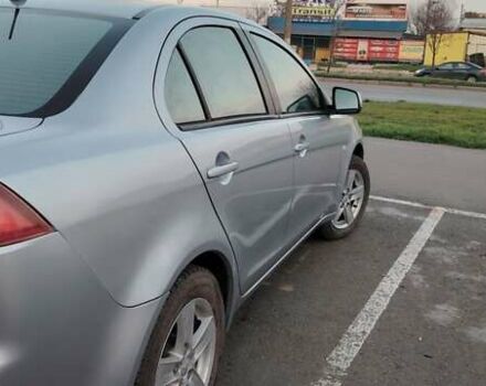 Серый Мицубиси Лансер, объемом двигателя 1.5 л и пробегом 201 тыс. км за 5600 $, фото 5 на Automoto.ua