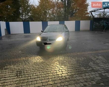Сірий Міцубісі Lancer, об'ємом двигуна 1.6 л та пробігом 330 тис. км за 3500 $, фото 26 на Automoto.ua