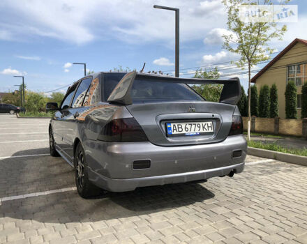 Сірий Міцубісі Lancer, об'ємом двигуна 1.58 л та пробігом 257 тис. км за 4400 $, фото 4 на Automoto.ua