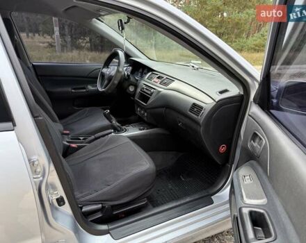 Серый Мицубиси Лансер, объемом двигателя 1.6 л и пробегом 200 тыс. км за 4400 $, фото 18 на Automoto.ua