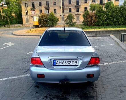 Сірий Міцубісі Lancer, об'ємом двигуна 1.6 л та пробігом 193 тис. км за 3999 $, фото 5 на Automoto.ua