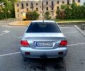 Сірий Міцубісі Lancer, об'ємом двигуна 1.6 л та пробігом 193 тис. км за 3999 $, фото 5 на Automoto.ua