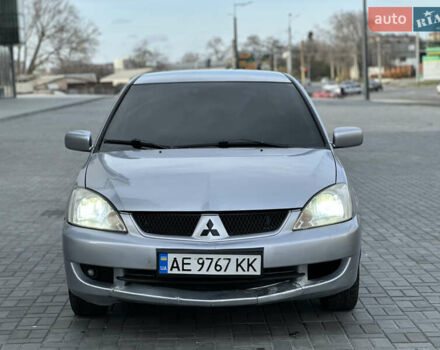 Серый Мицубиси Лансер, объемом двигателя 1.6 л и пробегом 200 тыс. км за 3900 $, фото 3 на Automoto.ua