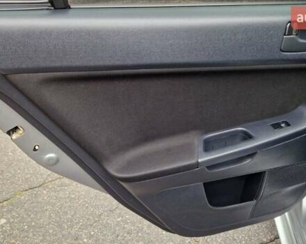 Серый Мицубиси Лансер, объемом двигателя 2 л и пробегом 213 тыс. км за 6550 $, фото 14 на Automoto.ua