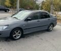 Серый Мицубиси Лансер, объемом двигателя 1.6 л и пробегом 175 тыс. км за 4500 $, фото 5 на Automoto.ua